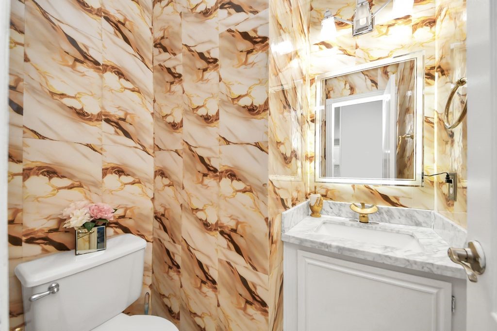 16506 Crossfield Drive Houston, TX 77095 - Photo 15 of 21 a bathroom with a sink and mirror with toilet