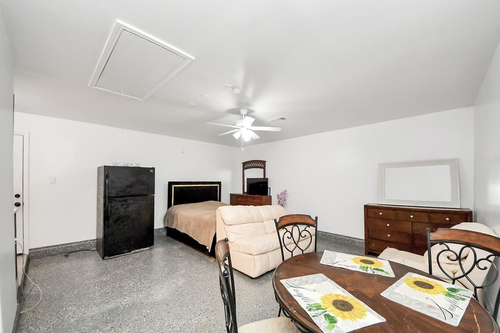 16506 Crossfield Drive Houston, TX 77095 - Photo 19 of 21 a bedroom with furniture and a chandelier