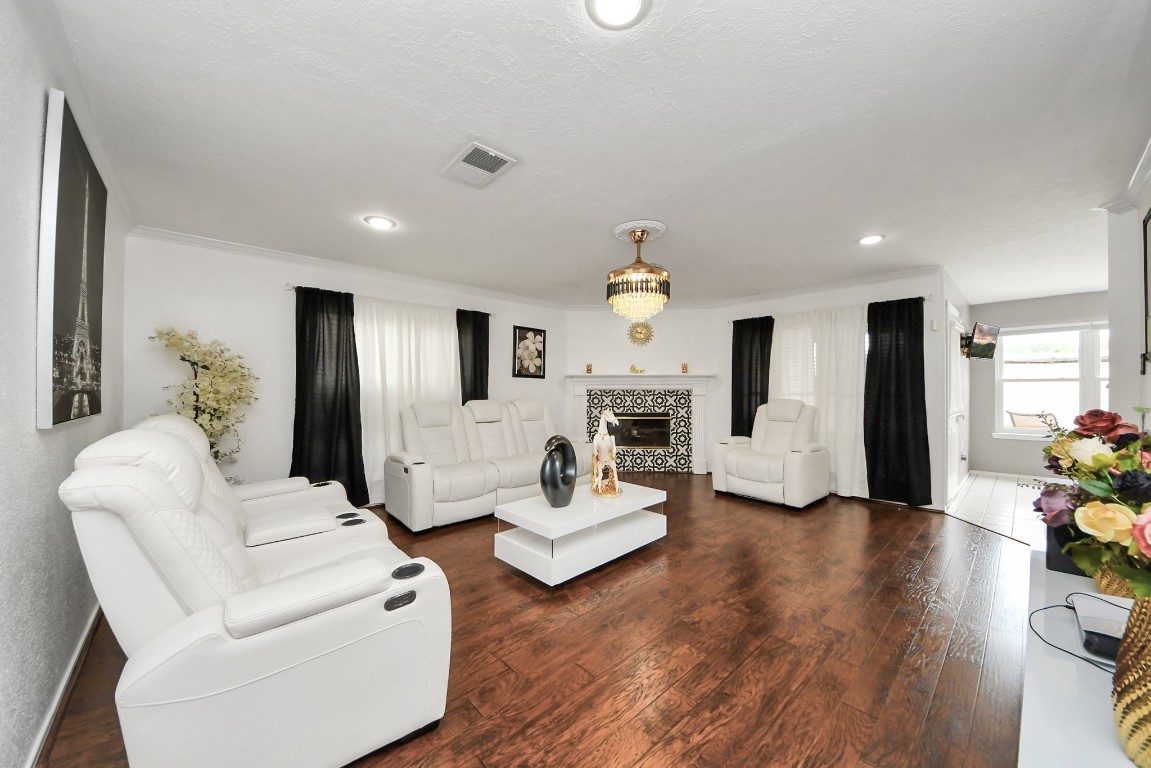 16506 Crossfield Drive Houston, TX 77095 - Photo 6 of 21 a living room with furniture and a wooden floor