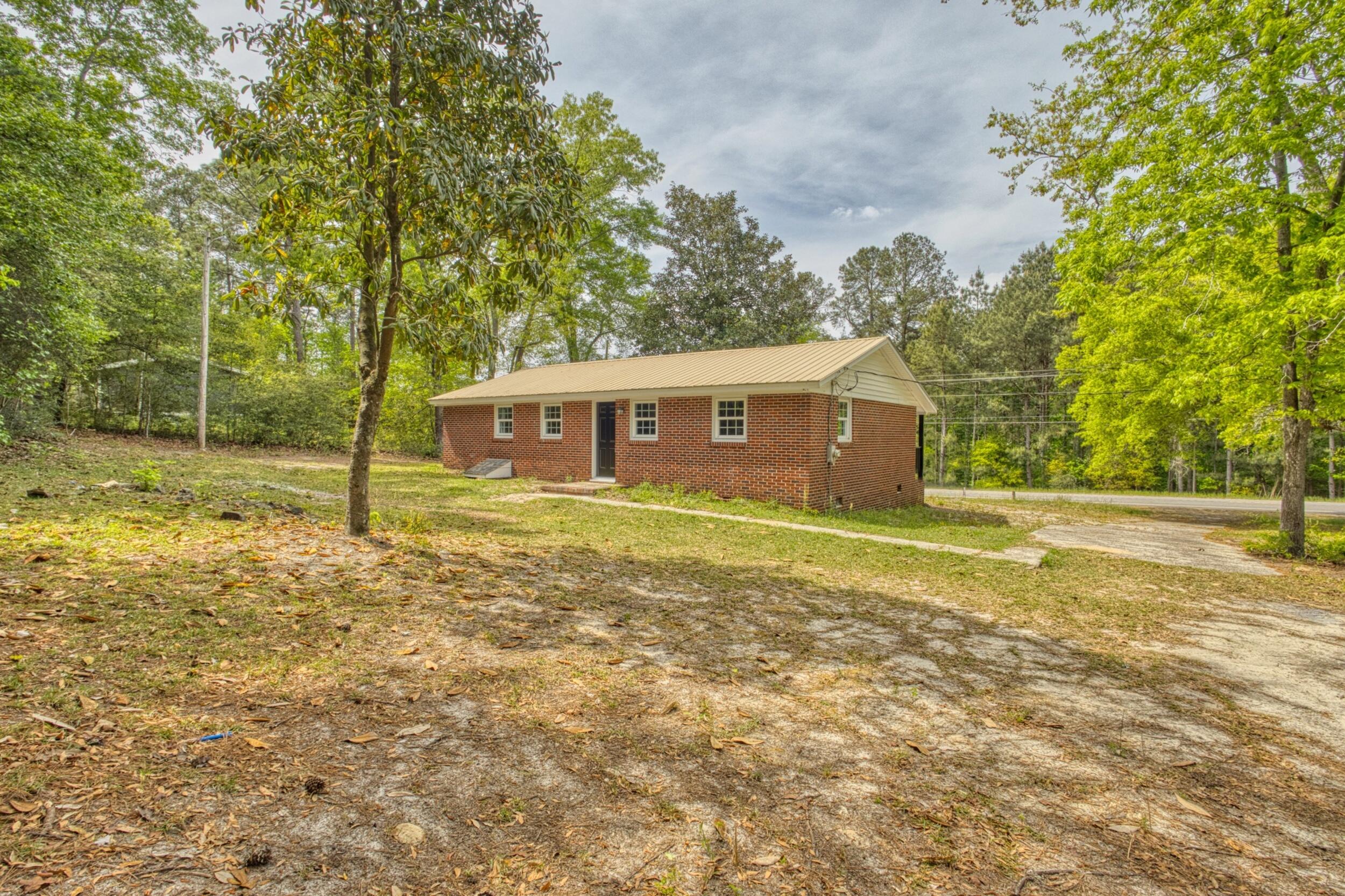 3016 Wagener Road Aiken, SC 29801 - Photo 26 of 29 a house view with swimming pool