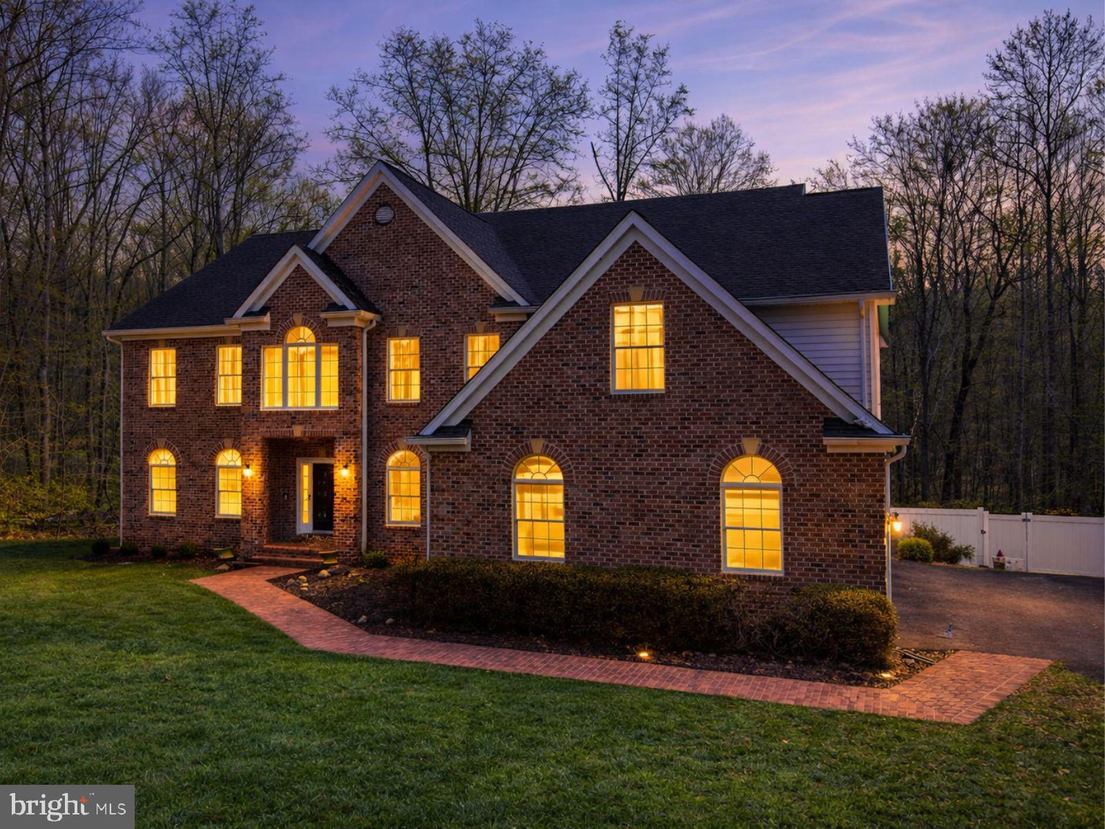 9401 Keyser Road Nokesville, VA 20181 - Photo 2 of 8 a front view of a house with a yard