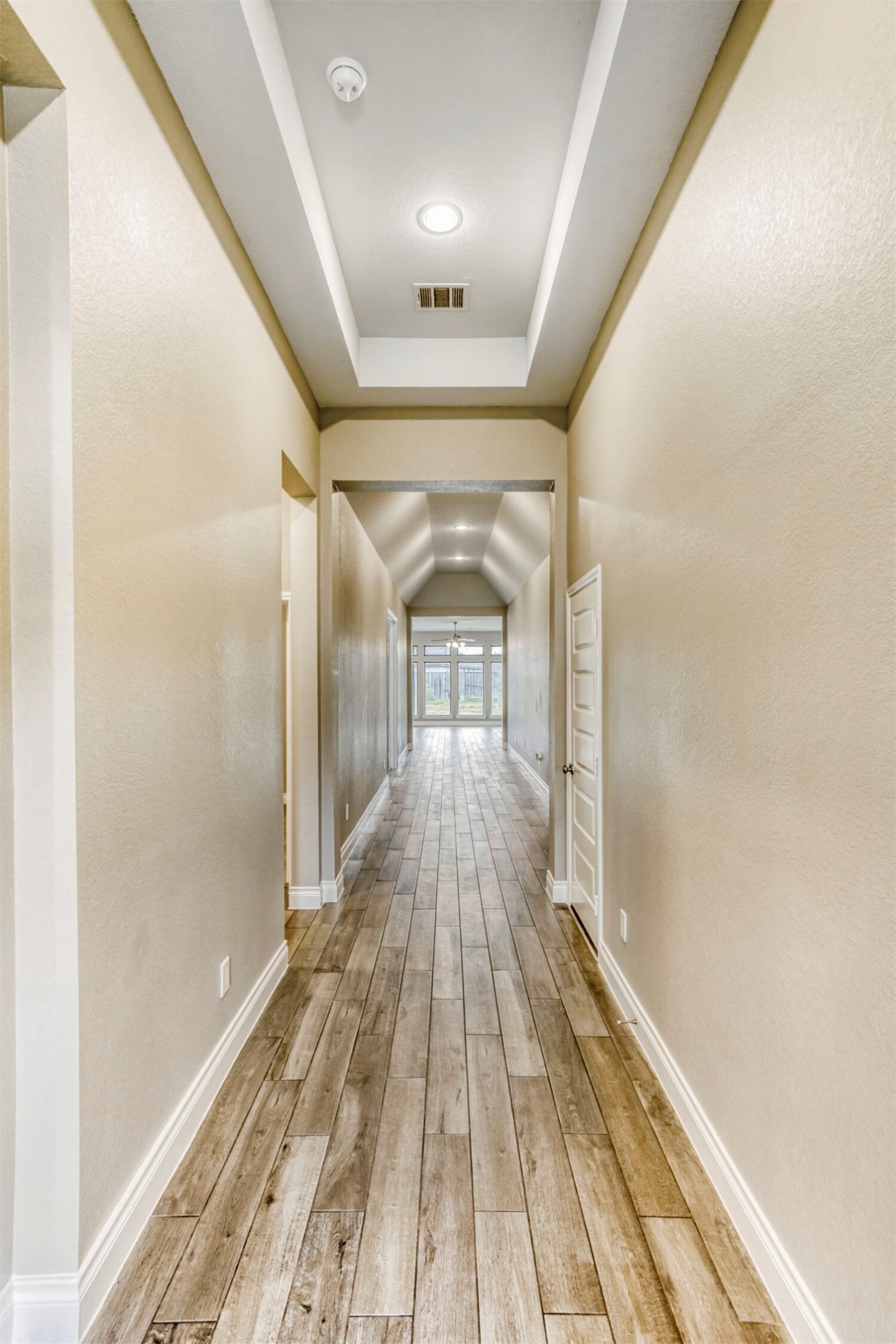 9219 Eckert Road Iowa Colony, TX 77583 - Photo 5 of 26 The entry hall is absolutely captivating, with 12 foot tray & vaulted ceilings and recessed light features.