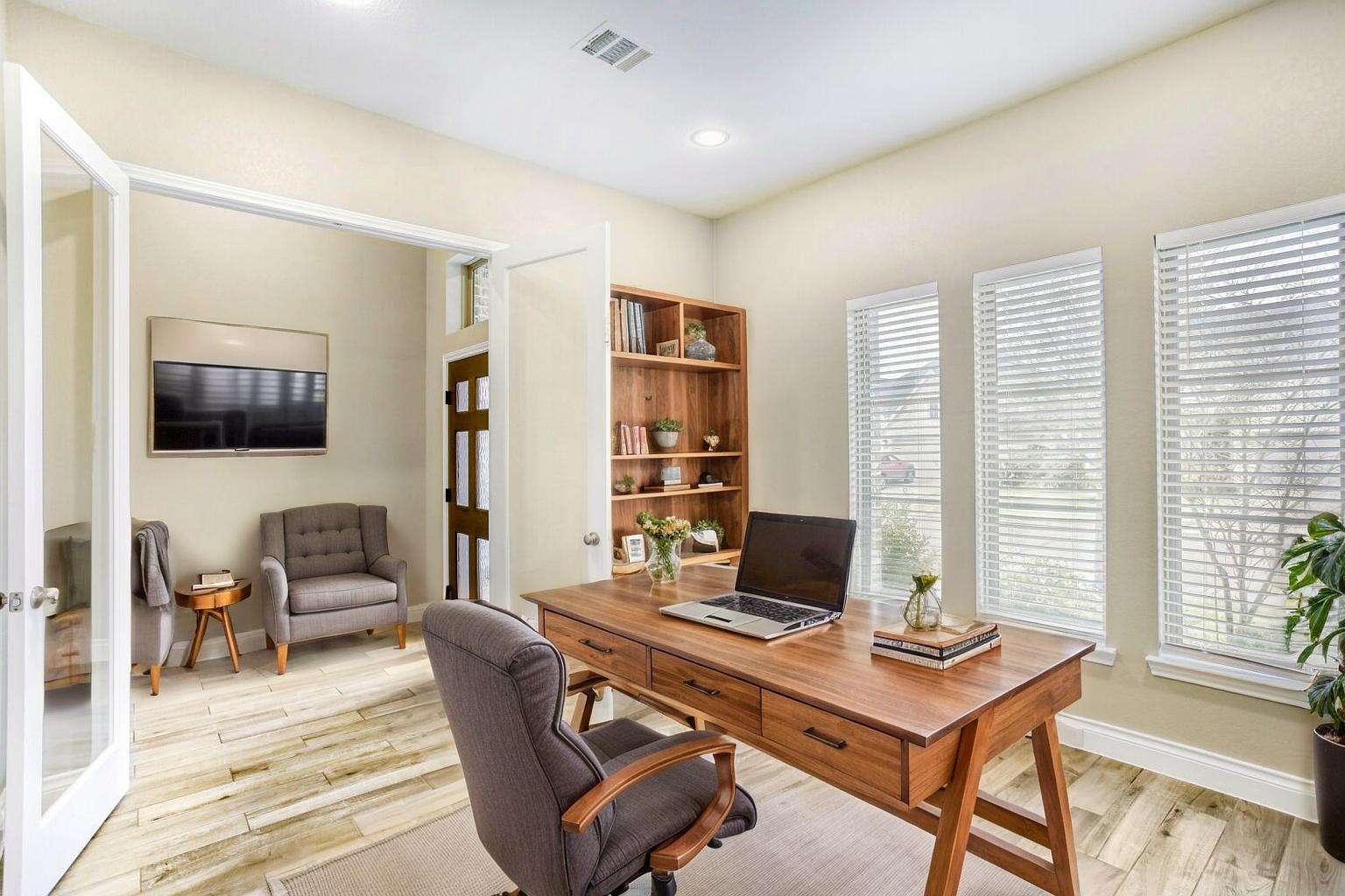 9219 Eckert Road Iowa Colony, TX 77583 - Photo 6 of 26 Just inside the front door is a flex space with french doors and a closet. This could be your home office, a library or an additonal bedroom for your guests! (photo is virtually staged to show the potential of the space)