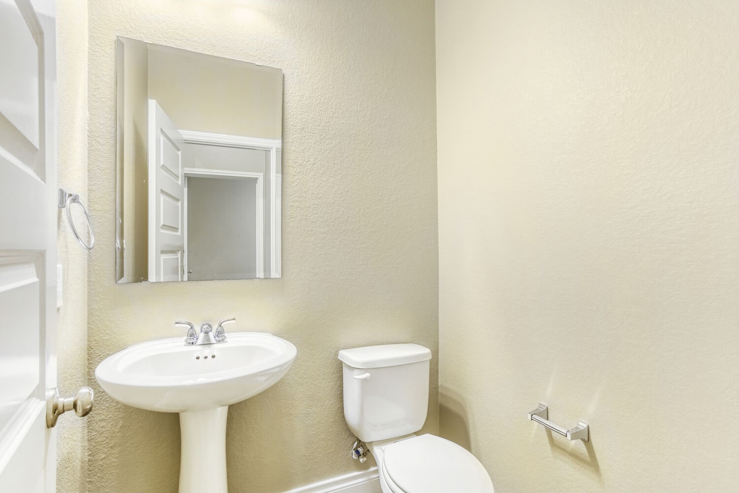 9219 Eckert Road Iowa Colony, TX 77583 - Photo 7 of 26 In the entry hall there is a half bath for your guests.