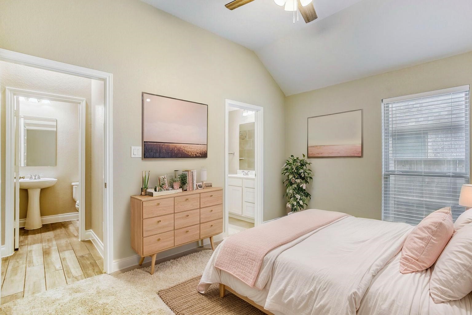 9219 Eckert Road Iowa Colony, TX 77583 - Photo 8 of 26 Across the hall from the half bath is a secondary bedroom with ensuite bathroom. Great for your guests or for multi-generational families. (photo is virtually staged to show the potential of the space)