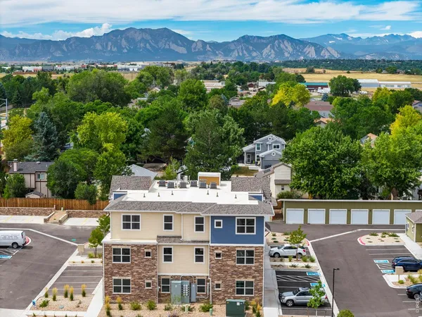 an aerial view of residential building with outdoor space