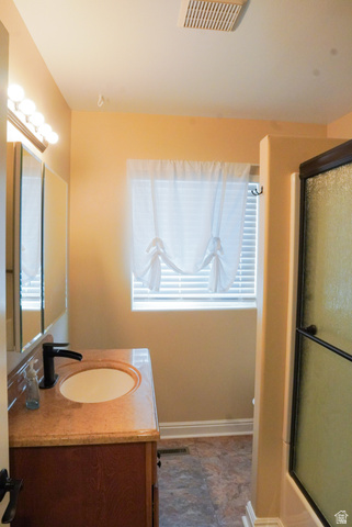 324 Stringtown Road Georgetown, ID 83239 - Photo 21 of 49 Bathroom featuring vanity and a shower with shower door