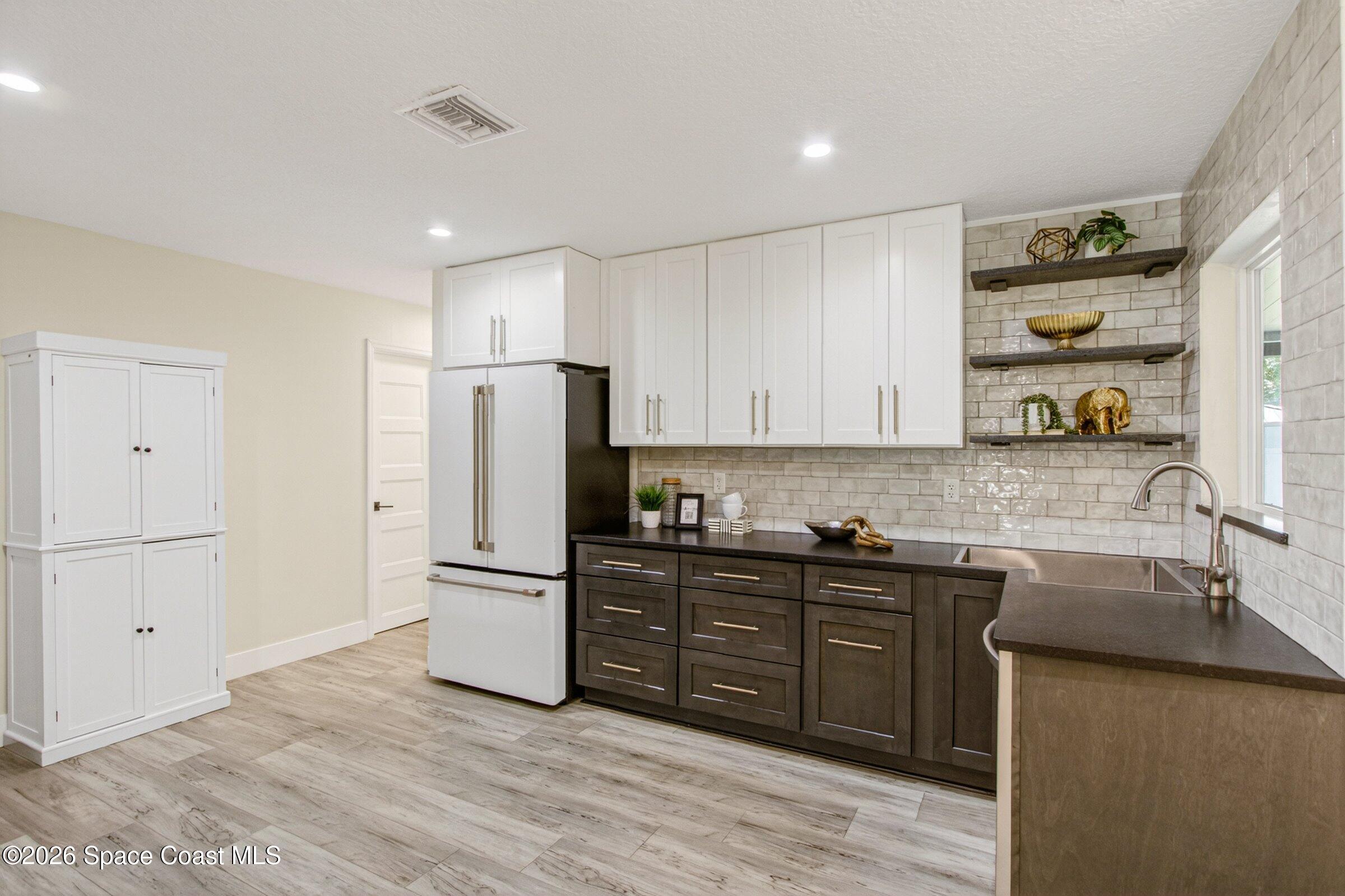 3255 Hield Road Melbourne, FL 32904 - Photo 7 of 29 39-3255-Hield-224