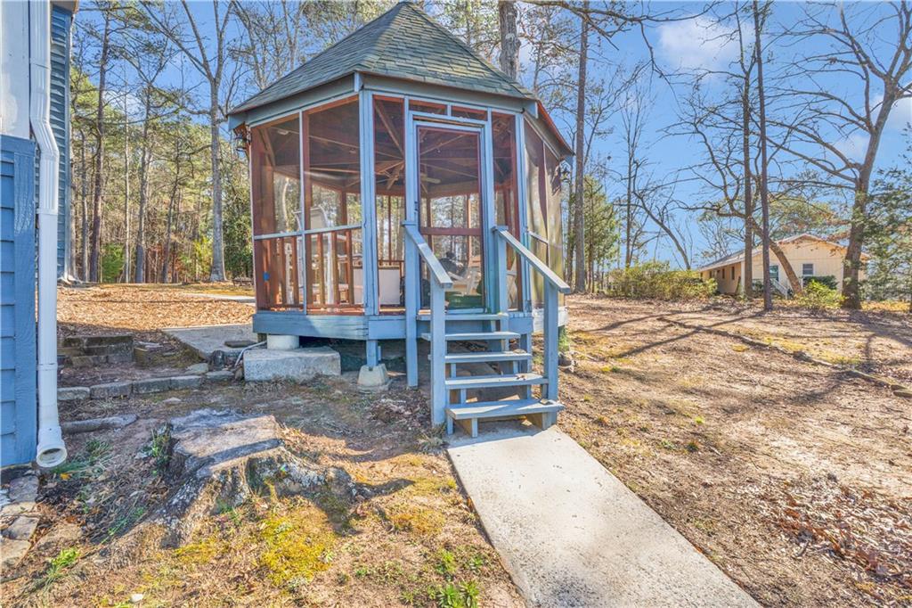 231 Cardinal Point Monticello, GA 31064 - Photo 11 of 40 a view of a house with a yard