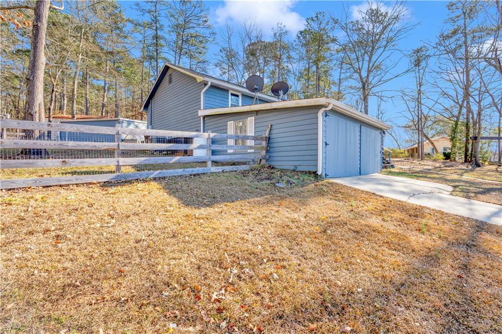 231 Cardinal Point Monticello, GA 31064 - Photo 12 of 40 a view of a house with a yard