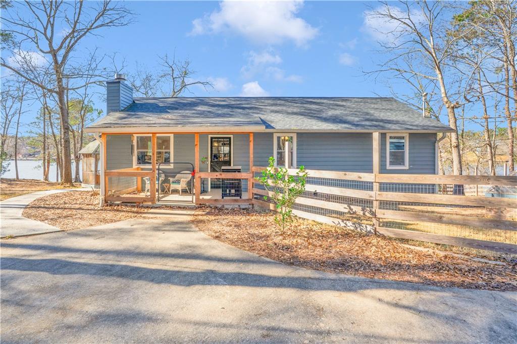 231 Cardinal Point Monticello, GA 31064 - Photo 2 of 40 a front view of a house with a patio