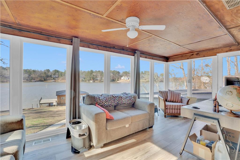 231 Cardinal Point Monticello, GA 31064 - Photo 30 of 40 a living room with furniture and a large window