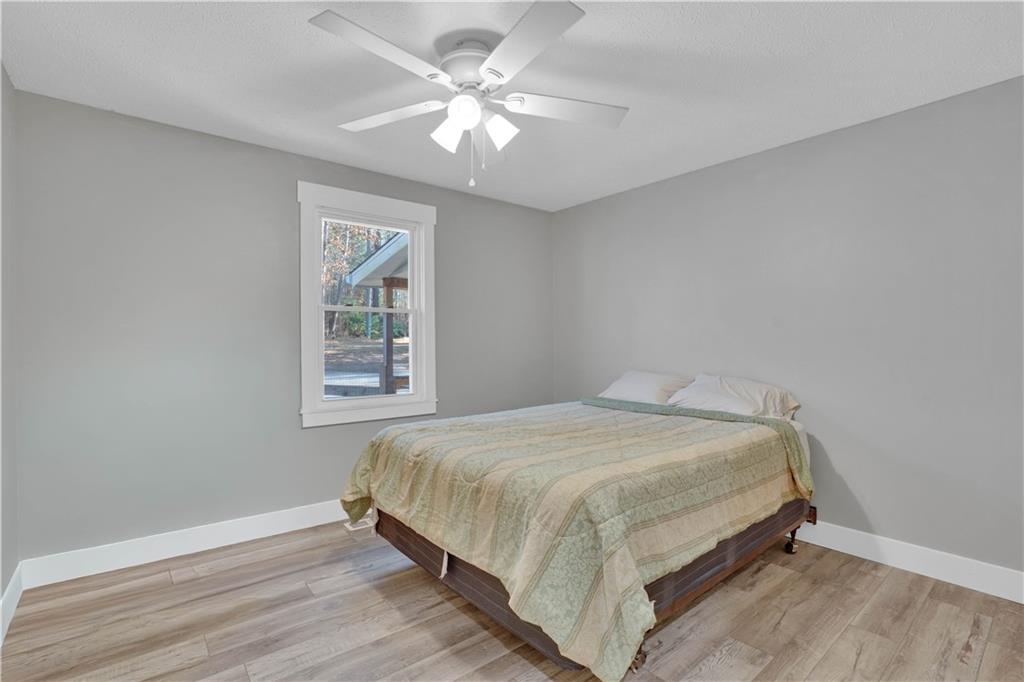 231 Cardinal Point Monticello, GA 31064 - Photo 36 of 40 a bedroom with a bed and a window