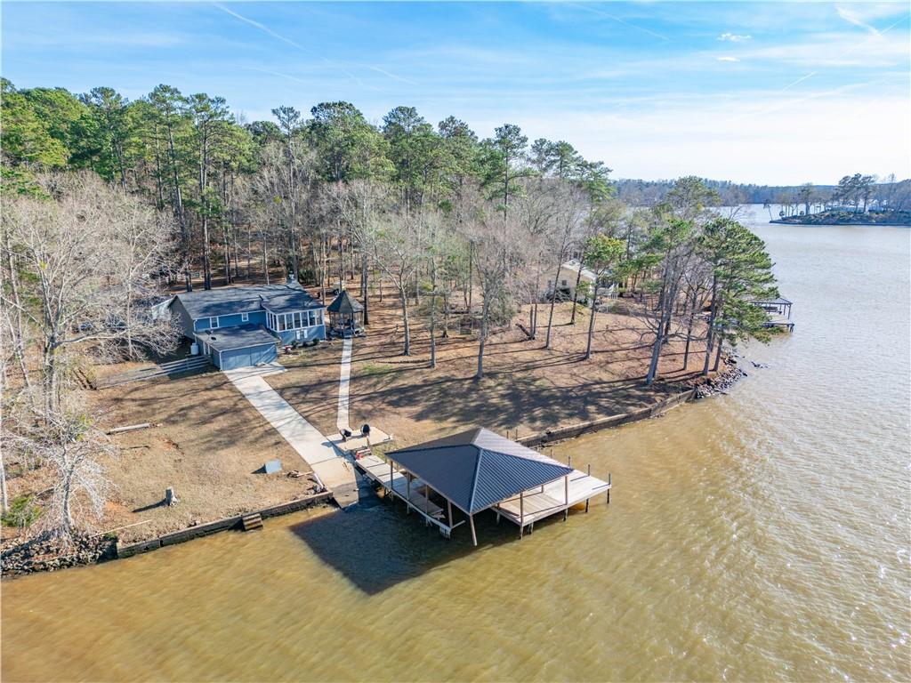 231 Cardinal Point Monticello, GA 31064 - Photo 39 of 40 a view of a lake with a mountain