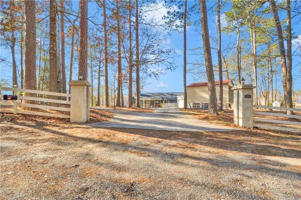 231 Cardinal Point Monticello, GA 31064 - Photo 4 of 40 a view of a building with a street