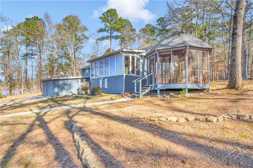 231 Cardinal Point Monticello, GA 31064 - Photo 10 of 40 a view of a house with a snow on the road