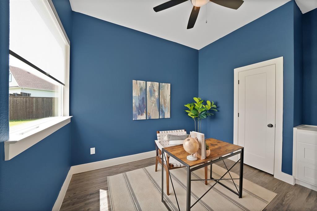 2223 Providence Way Nevada, TX 75173 - Photo 8 of 40 a dining room with furniture and wooden floor