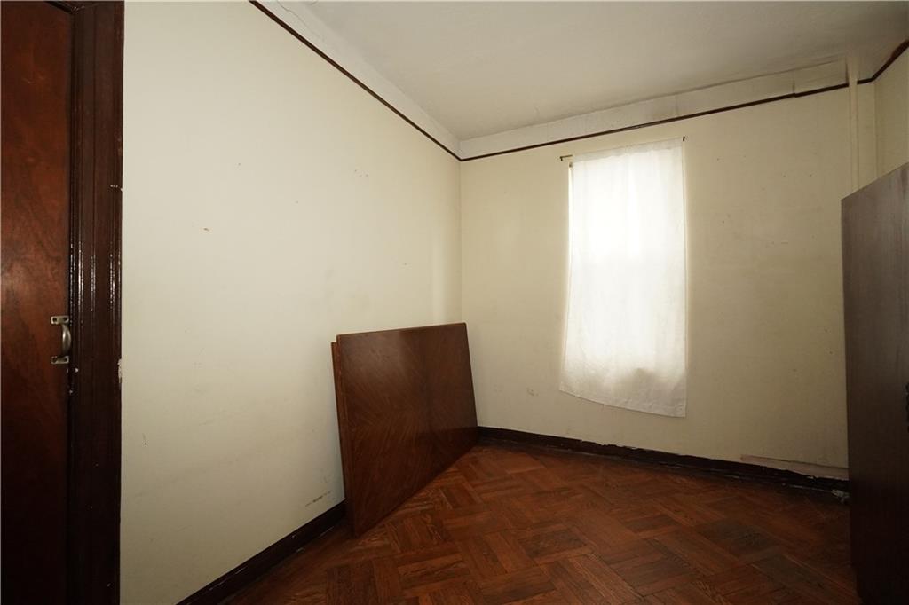 1636 Dahill Road Brooklyn, NY 11223 - Photo 11 of 19 a view of a room with wooden floor and windows