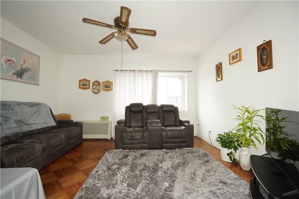 1636 Dahill Road Brooklyn, NY 11223 - Photo 5 of 19 a living room with furniture and a chandelier