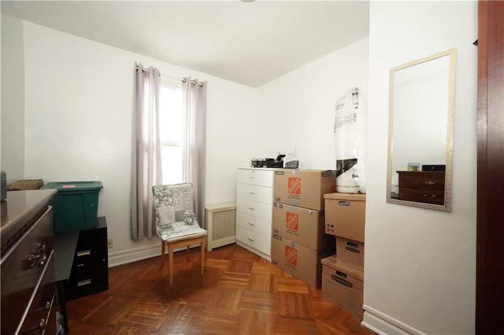 1636 Dahill Road Brooklyn, NY 11223 - Photo 6 of 19 a room with furniture a rug and a window