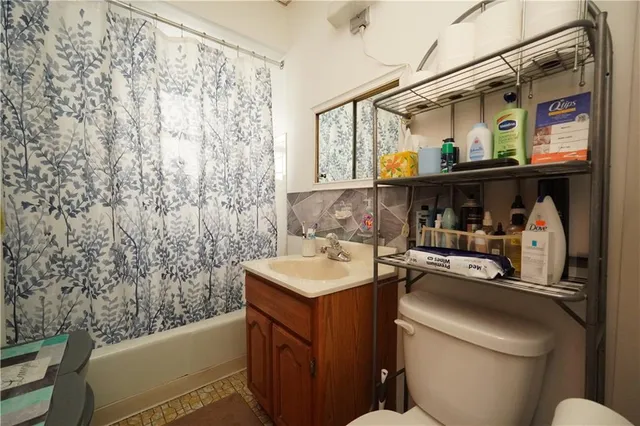 a bathroom with a sink and a toilet