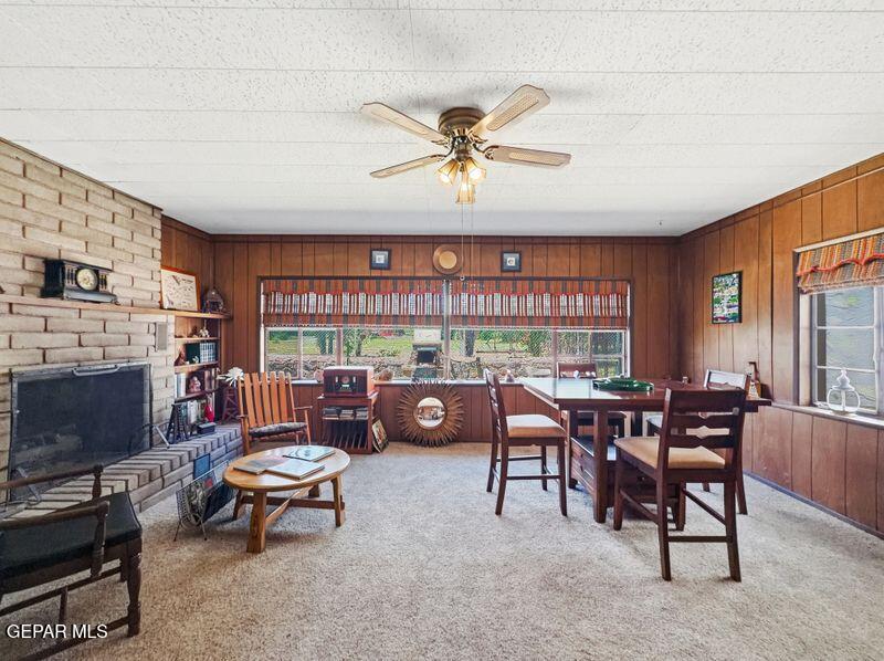 4135 Emory Road El Paso, TX 79922 - Photo 44 of 73 a living room with furniture a fireplace and a large window