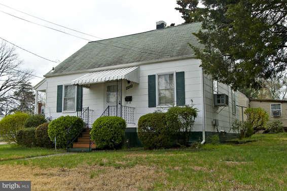 4523 Maple Road Morningside, MD 20746 - Photo 1 of 19 a view of a house with a garden