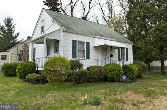 4523 Maple Road Morningside, MD 20746 - Photo 2 of 19 a view of a house with backyard and garden