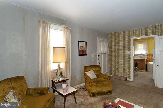 4523 Maple Road Morningside, MD 20746 - Photo 7 of 19 a living room with furniture and a window
