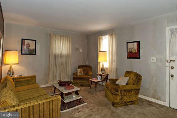 4523 Maple Road Morningside, MD 20746 - Photo 8 of 19 a living room with furniture and a window