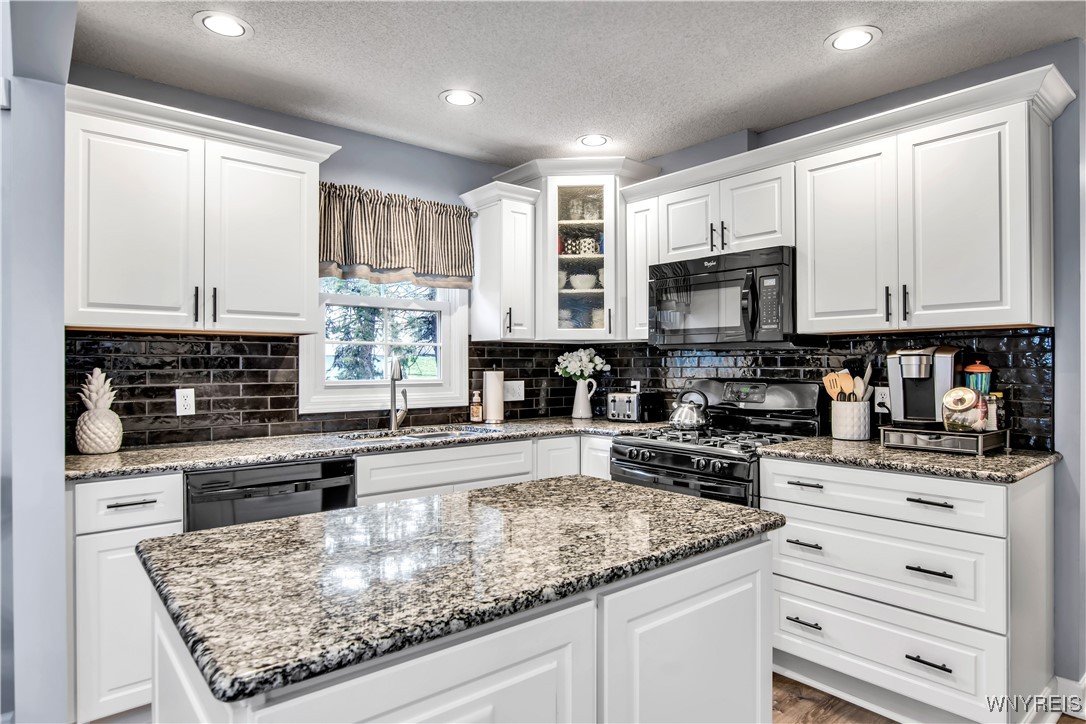 2850 Amsdell Road, Unit 1 Hamburg, NY 14075 - Photo 12 of 50 KIT:Lots of cabinets, BI dishwasher + microwave