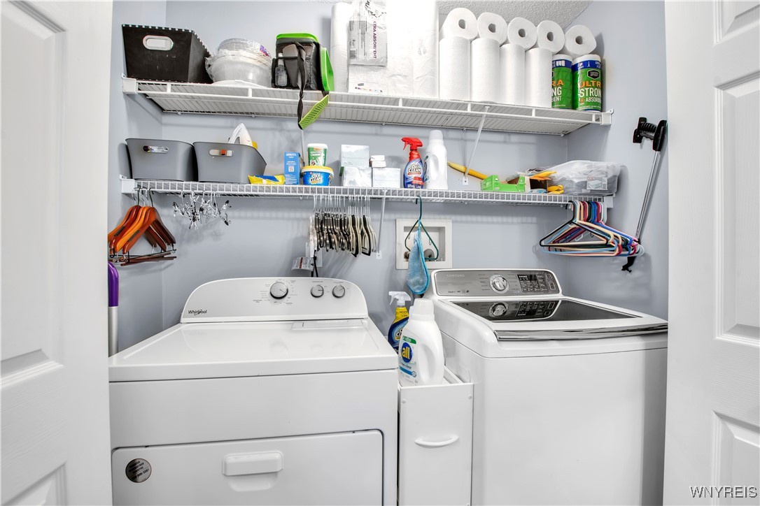 2850 Amsdell Road, Unit 1 Hamburg, NY 14075 - Photo 17 of 50 1st floor laundry - ventilated shelves - light