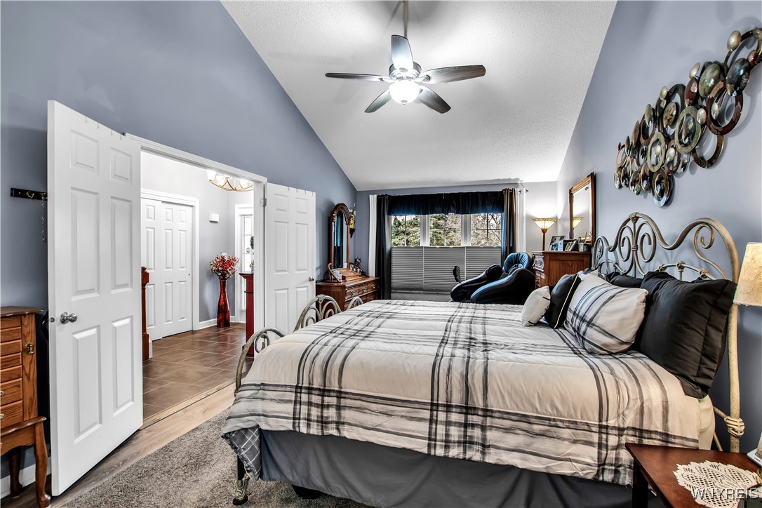 2850 Amsdell Road, Unit 1 Hamburg, NY 14075 - Photo 19 of 50 Primary 1st flr. Bdrm w/vaulted ceiling, ceiling f