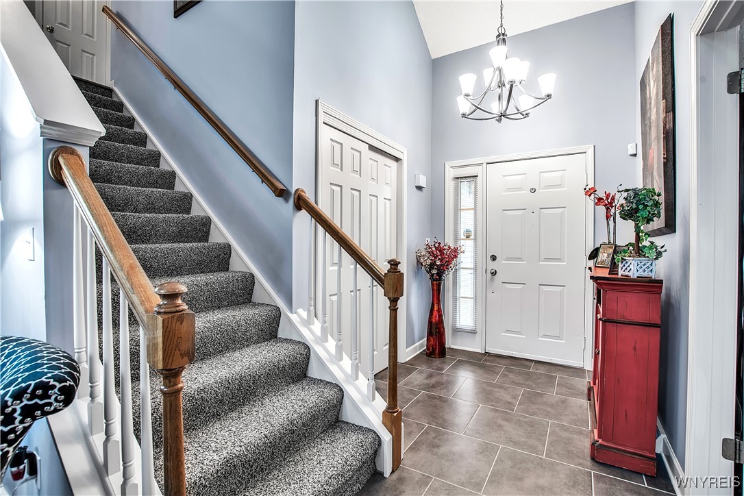 2850 Amsdell Road, Unit 1 Hamburg, NY 14075 - Photo 2 of 50 Bright ceramic tiled Foyer - guest closet
