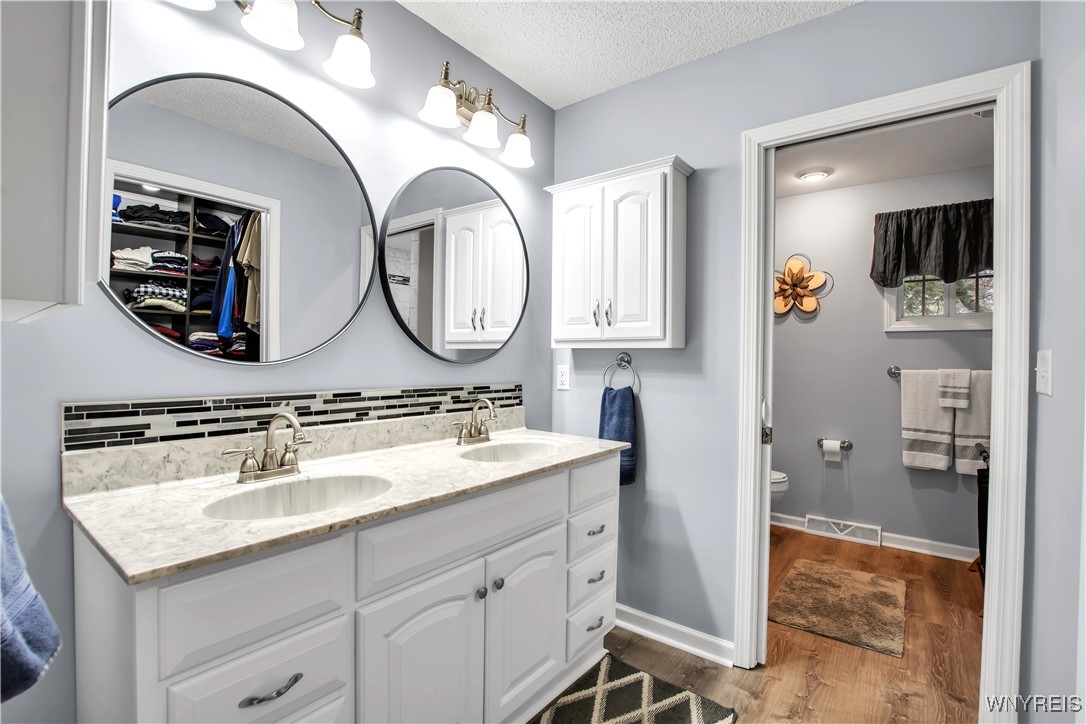 2850 Amsdell Road, Unit 1 Hamburg, NY 14075 - Photo 23 of 50 Primary BD: Attractive vanity - adjacent room w/co