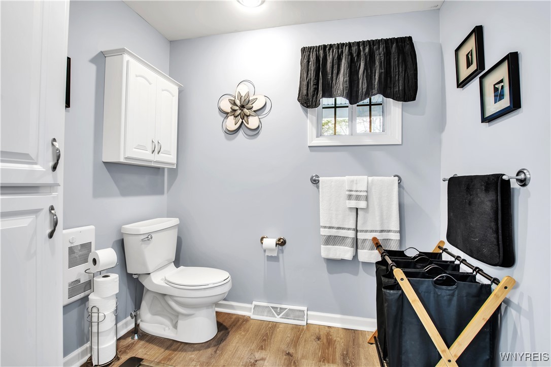 2850 Amsdell Road, Unit 1 Hamburg, NY 14075 - Photo 25 of 50 Primary Bath - commode has wall cabinet above - to