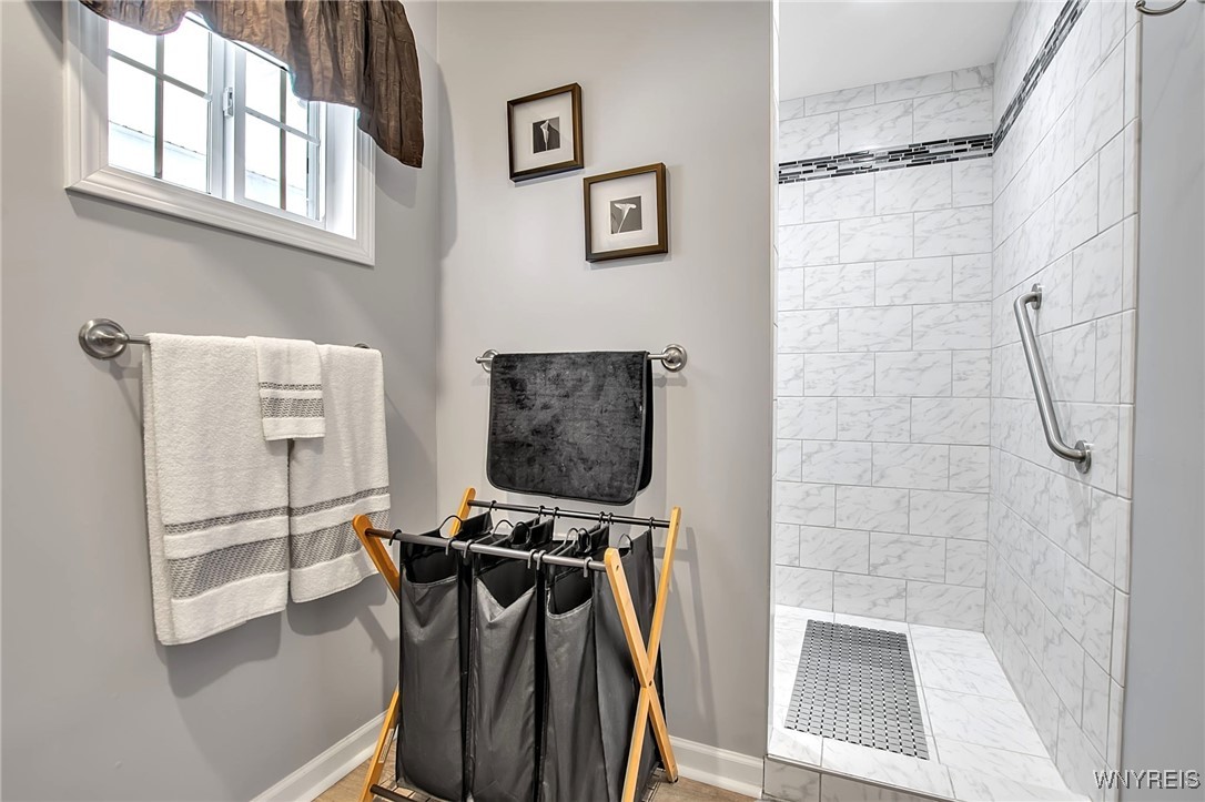 2850 Amsdell Road, Unit 1 Hamburg, NY 14075 - Photo 26 of 50 Primary BA: Oversized shower stall entrance