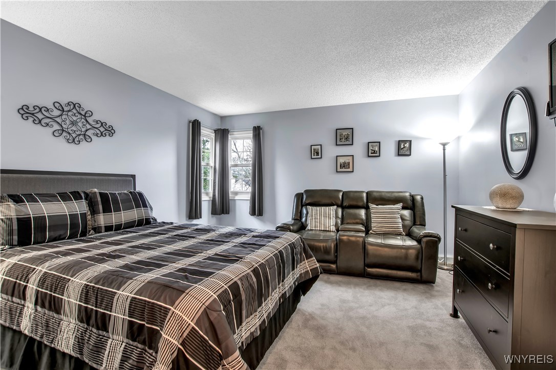 2850 Amsdell Road, Unit 1 Hamburg, NY 14075 - Photo 29 of 50 2nd flr carpeted BDRM - corner windows - walk-in c