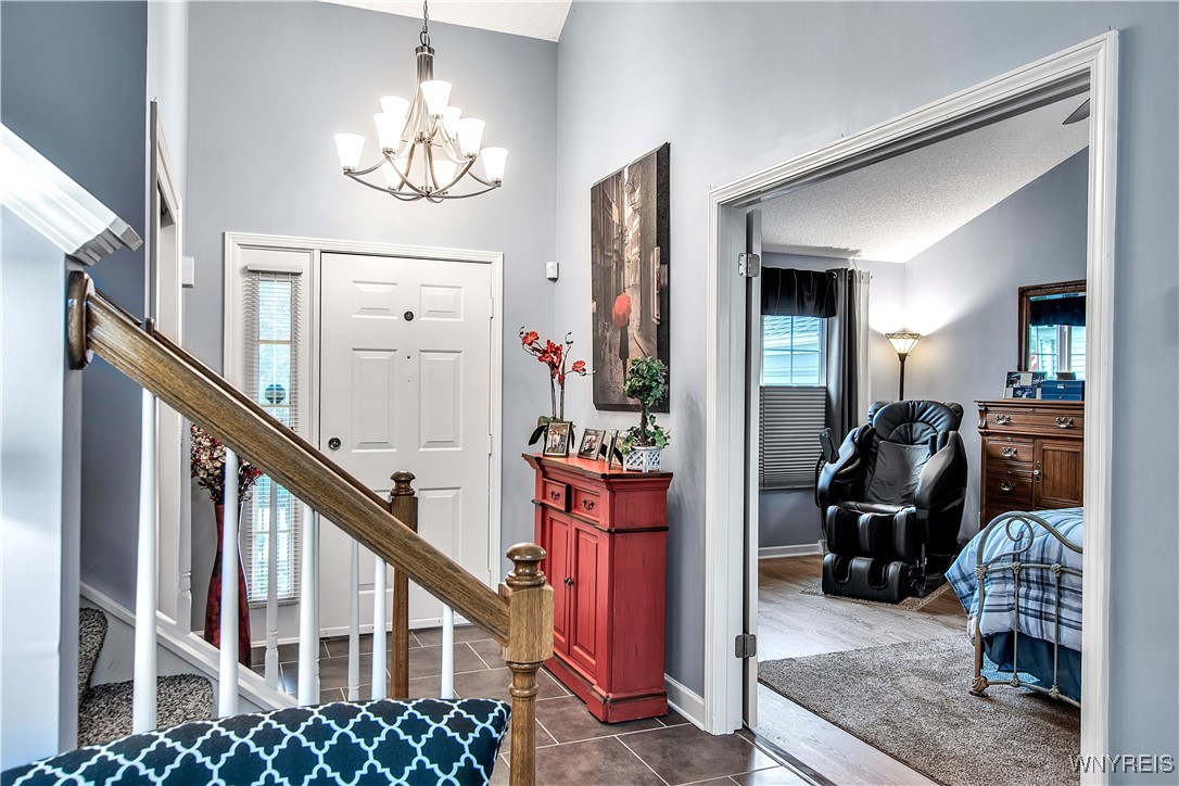 2850 Amsdell Road, Unit 1 Hamburg, NY 14075 - Photo 3 of 50 Double 6 panel entry drs to 1st flr Primary Bdrm