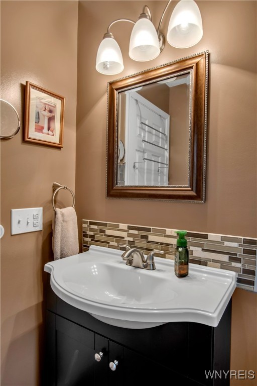 2850 Amsdell Road, Unit 1 Hamburg, NY 14075 - Photo 33 of 50 2nd flr updated Bath: Close up of vanity, glass ti