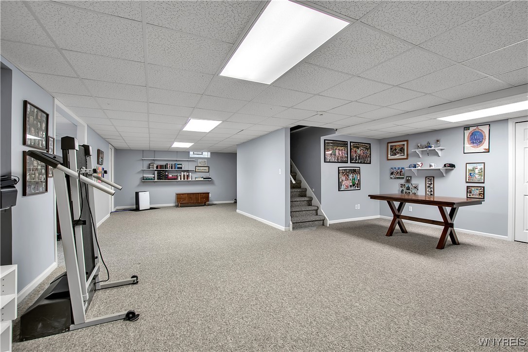 2850 Amsdell Road, Unit 1 Hamburg, NY 14075 - Photo 38 of 50 Basement: Carpeted 35 ft L shaped Rec Room - dropp