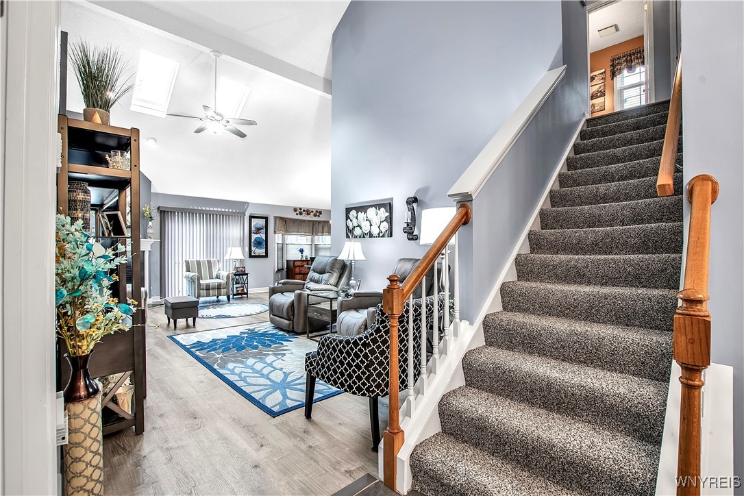 2850 Amsdell Road, Unit 1 Hamburg, NY 14075 - Photo 4 of 50 Stairs to 2nd flr overlooks Liv Rm w/fireplace + s