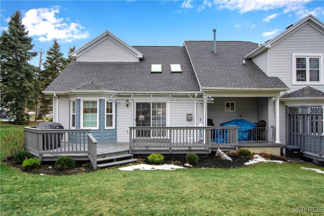 2850 Amsdell Road, Unit 1 Hamburg, NY 14075 - Photo 46 of 50 Attractive backyard deck, stairs, awning, sliding