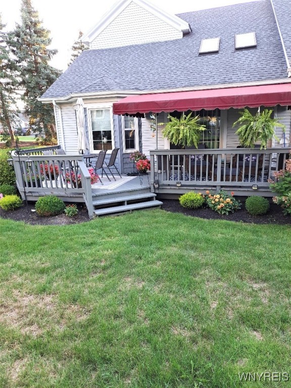 2850 Amsdell Road, Unit 1 Hamburg, NY 14075 - Photo 47 of 50 Deck area w/pretty awning - colorful flowers