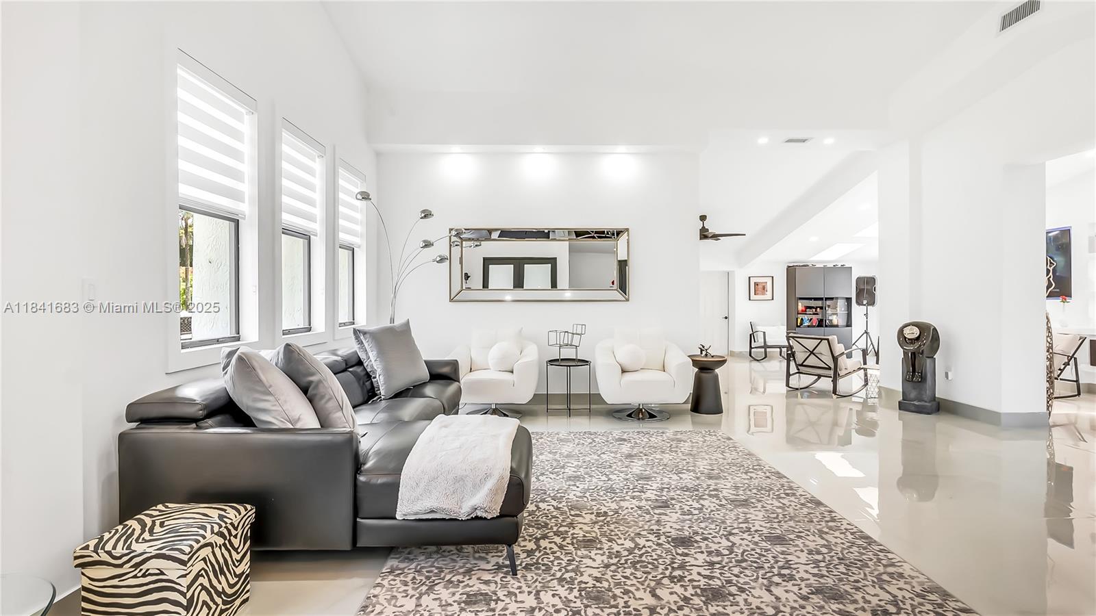 17101 Southwest 48th Street Southwest Ranches, FL 33331 - Photo 14 of 40 a living room with furniture and wooden floor