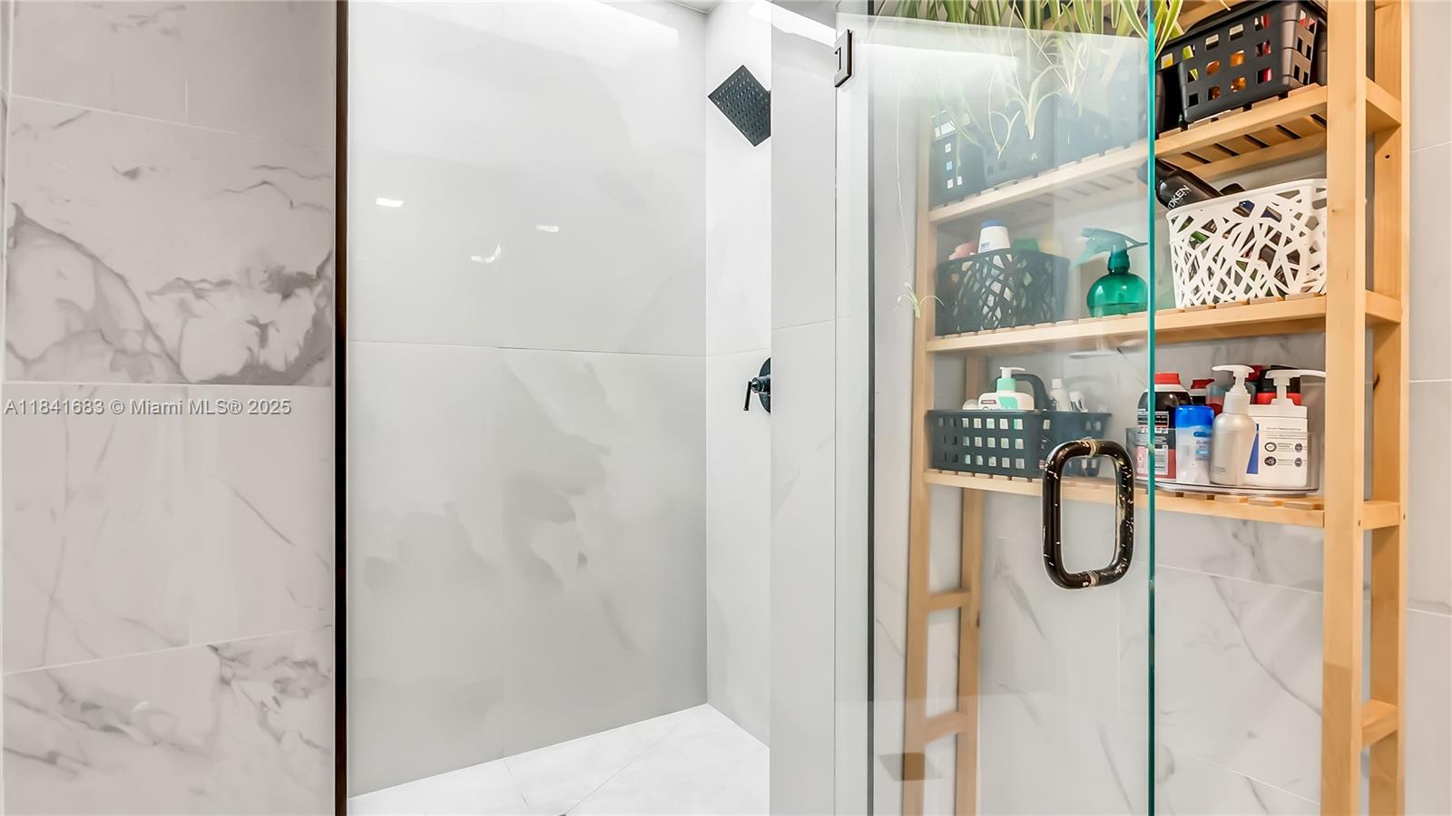 17101 Southwest 48th Street Southwest Ranches, FL 33331 - Photo 18 of 40 a bathroom with a shower