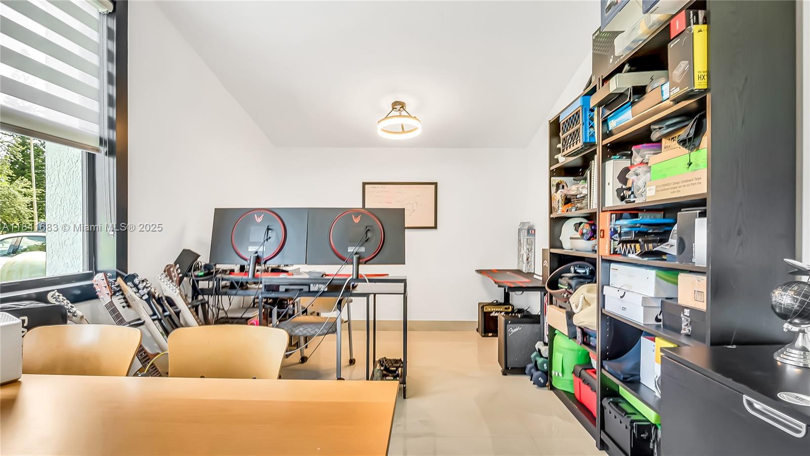 17101 Southwest 48th Street Southwest Ranches, FL 33331 - Photo 25 of 40 a living room with lots of furniture and a flat screen tv