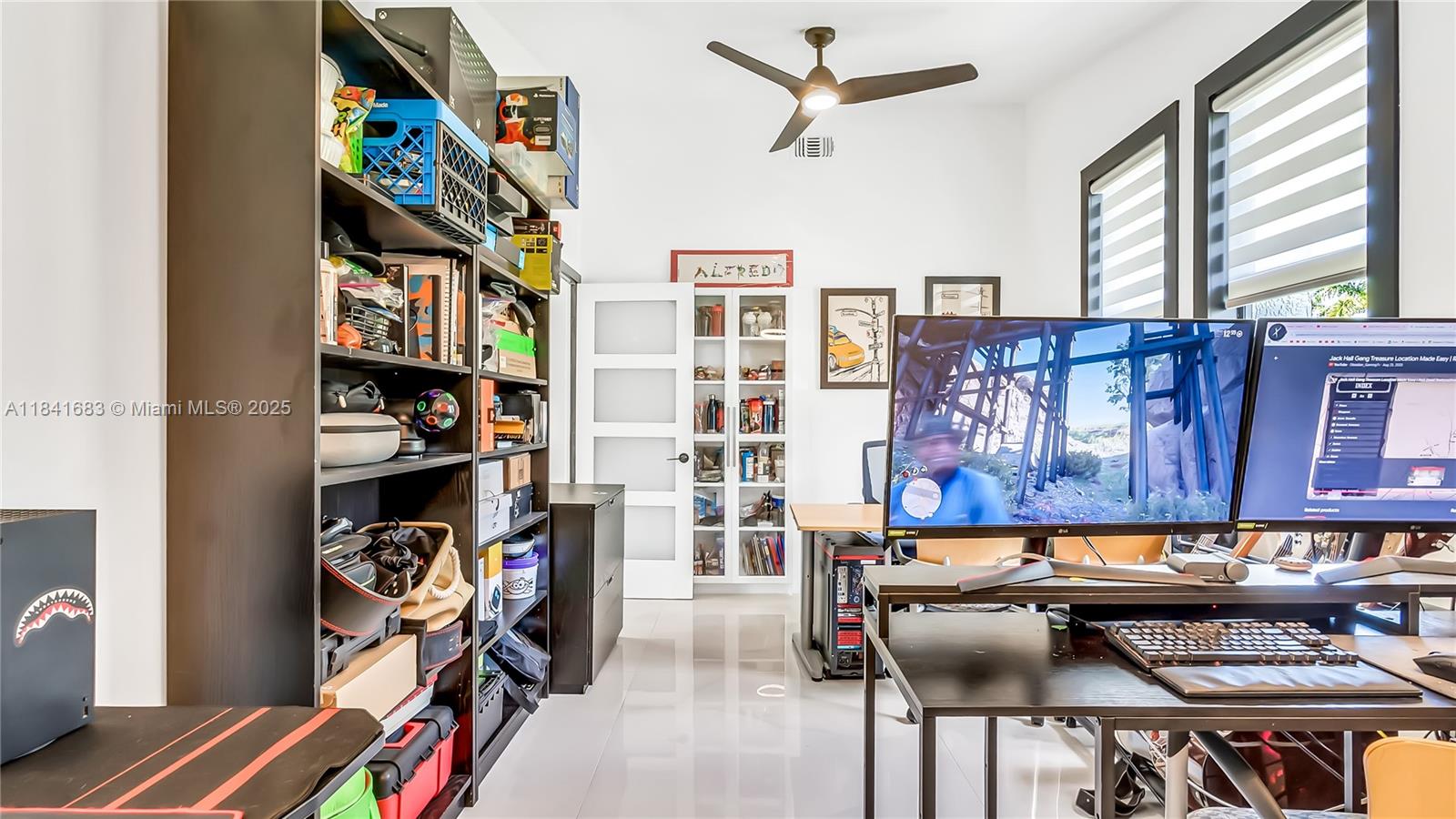 17101 Southwest 48th Street Southwest Ranches, FL 33331 - Photo 26 of 40 a view of a workspace with furniture and a window
