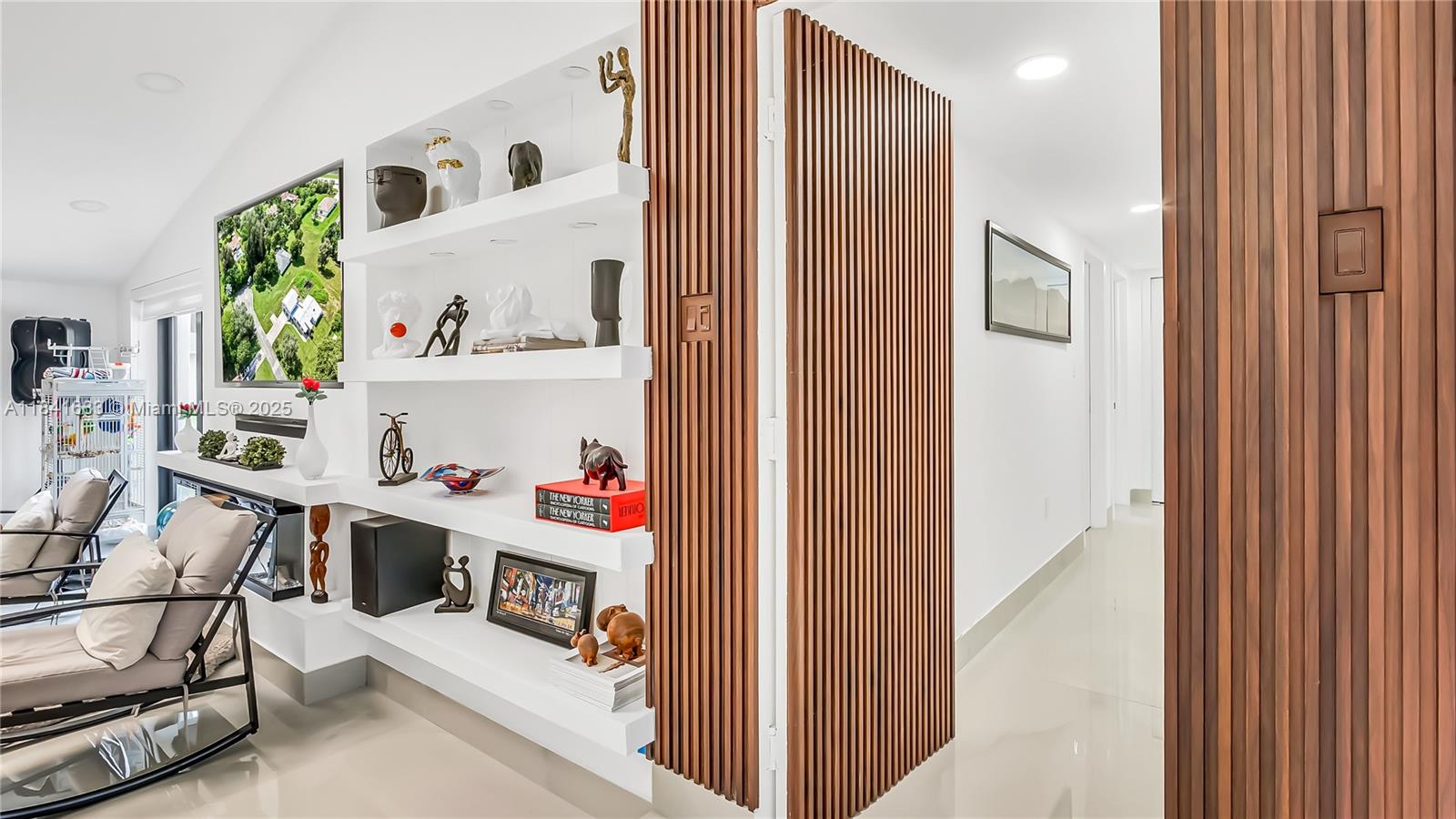 17101 Southwest 48th Street Southwest Ranches, FL 33331 - Photo 5 of 40 a room with furniture and white walls