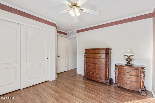 a view of room with wooden floor